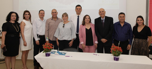 Ono Staff Signing Agreement for Nazareth Nursing Program