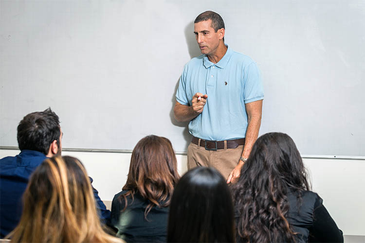 Every student must perform four academic hours of service, often in underserved communities